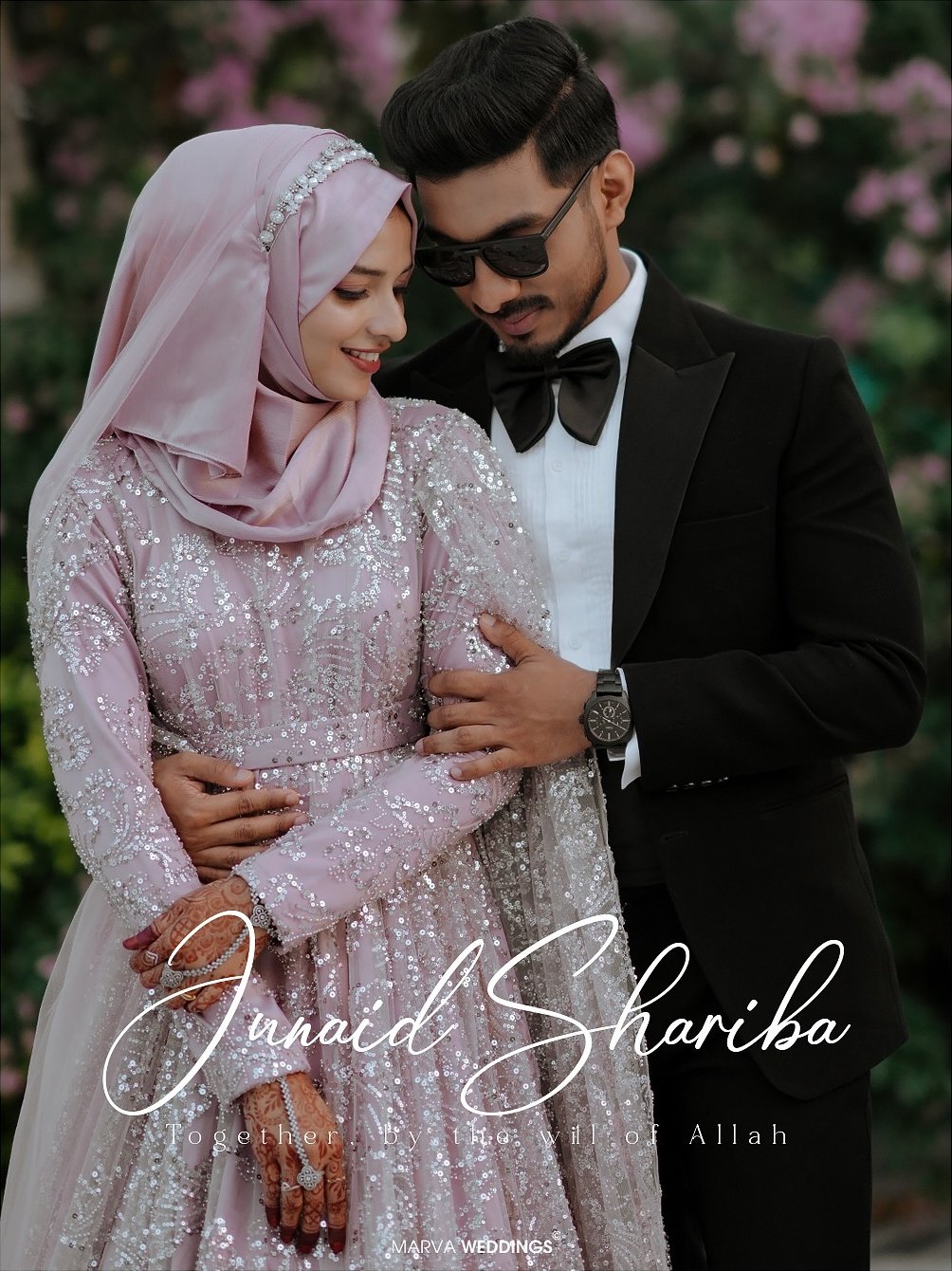 Newlyweds embracing in a garden portrait
